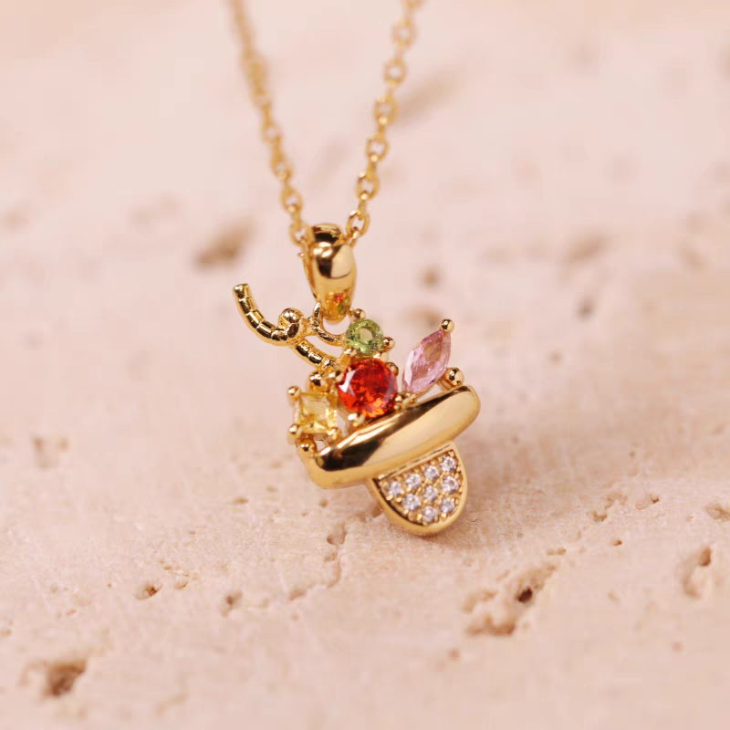 Colección Sobremesa de diseño original artesanal de Kemstone: collar de cóctel original en plata de ley 925 con baño de oro y circonitas de colores, un regalo único para mujer.