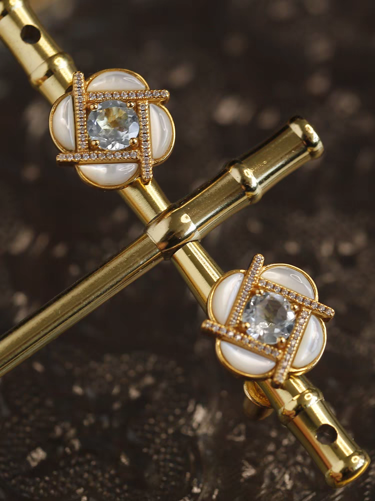 Kemstone Handcrafted Original Design Clover Windmill Earrings – Gold-Plated Silver Mother-of-Pearl Studs with Sky Blue Topaz Accents
