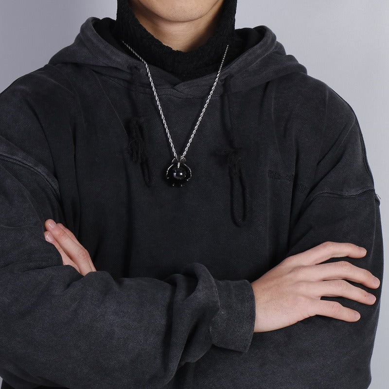 Kemstone Men’s Titanium Steel Claw Pendant – Black Glass Orb KP43972